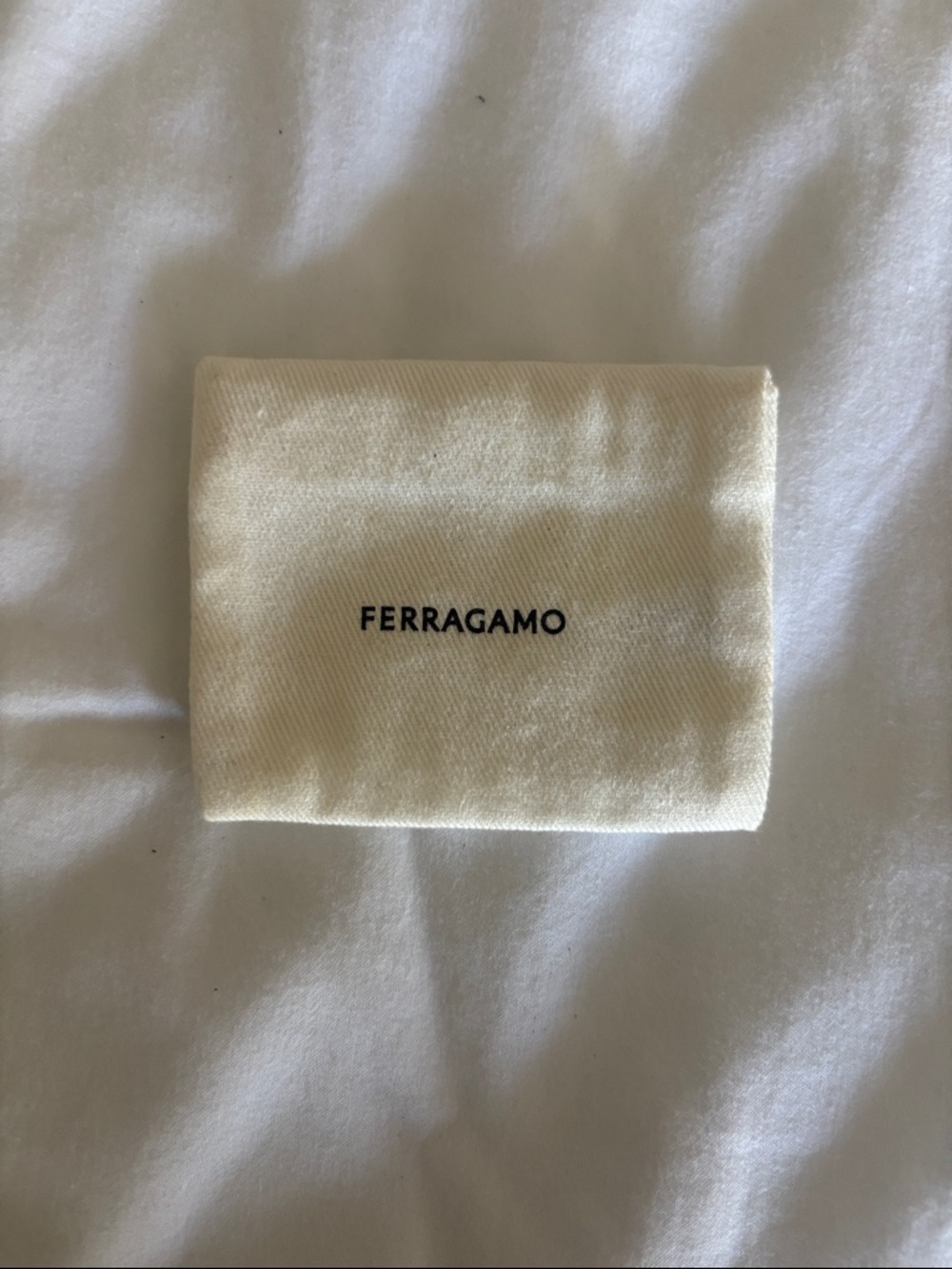 Salvatore Ferragamo Cream Dust Bag with Black Logo